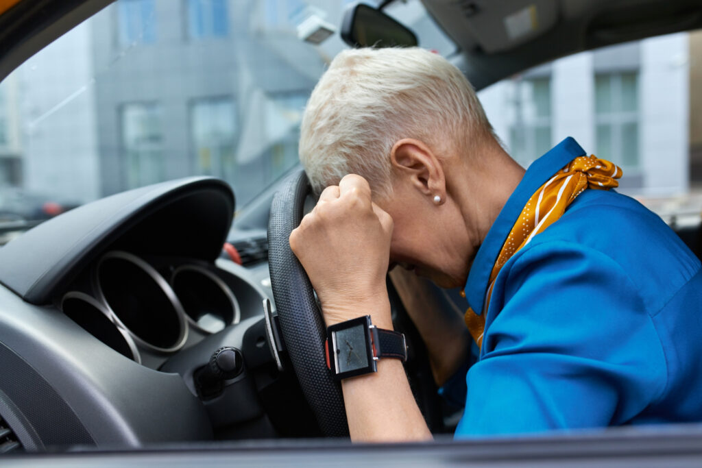 frustrated driver because of unresponsive steering wheel